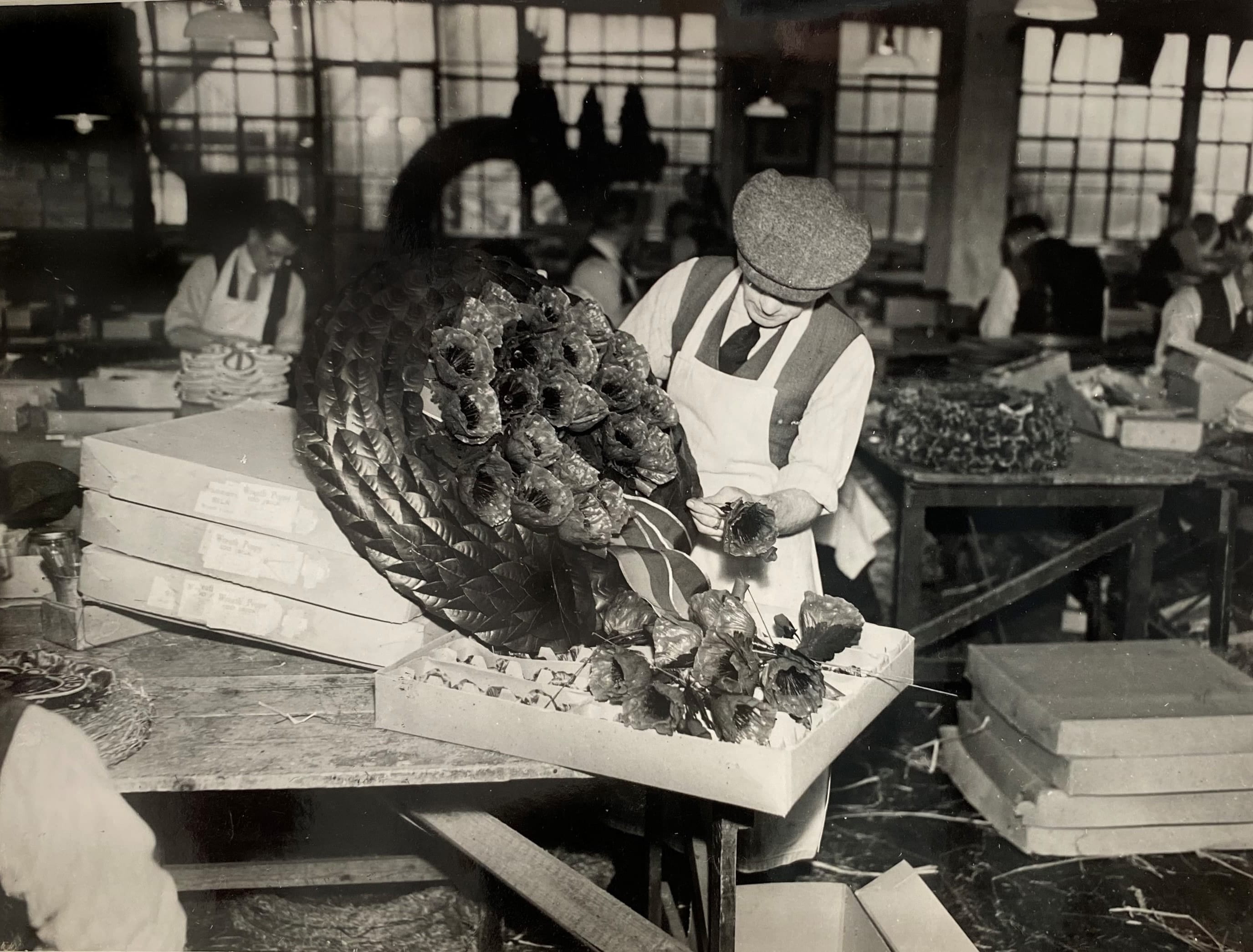 A special wreath maker prepares a Remembrance wreath for King George VI, c. late 1930s.